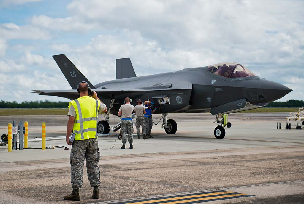 U.S. Airmen begin refueling an F-35A Lightning II during a hot pit session on the 33rd Fighter Wing flightline at Eglin Air Force Base, Fla. All of the F-35 variants use the refueling areas in conjunction with the 96th Logistics Readiness Squadron’s fuels flight. (Photo by U.S. Air Force photo/Samuel King Jr.-USAF/Eglin AFB)